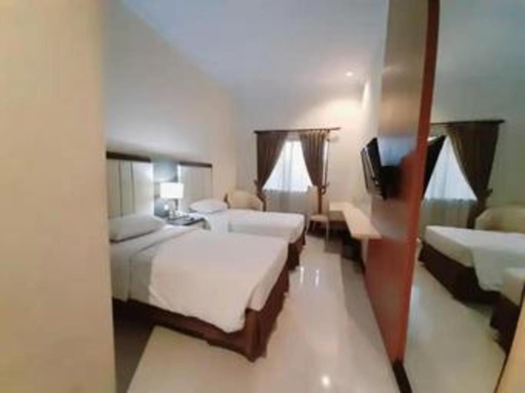 Bella Hotel Surabaya Kültér fotó
